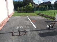 a parking lot with a number on the ground at résidence la clairière aux portes de la baie de Somme in Abbeville