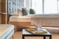 Posteľ alebo postele v izbe v ubytovaní hirschen dornbirn - das boutiquestyle hotel