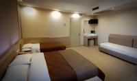 Posteľ alebo postele v izbe v ubytovaní Filippion Hotel