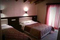 Posteľ alebo postele v izbe v ubytovaní Filippion Hotel