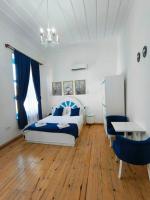 Postel nebo postele na pokoji v ubytování MAVİ PALAS HOTEL