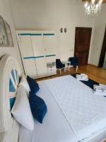 Postel nebo postele na pokoji v ubytování MAVİ PALAS HOTEL