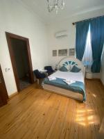 Postel nebo postele na pokoji v ubytování MAVİ PALAS HOTEL