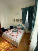 Postel nebo postele na pokoji v ubytování MAVİ PALAS HOTEL