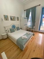 Postel nebo postele na pokoji v ubytování MAVİ PALAS HOTEL