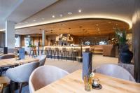 Reštaurácia alebo iné gastronomické zariadenie v ubytovaní Das Walchsee Aktivresort