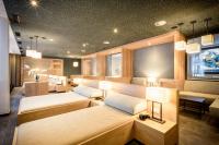 Posteľ alebo postele v izbe v ubytovaní Das Walchsee Aktivresort