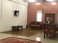 Laman Norras Homestayにあるテレビまたはエンターテインメントセンター