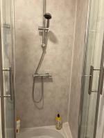 a shower in a bathroom with a tub and a sink at Bel appartement hyper centre in Bernay