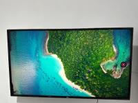 A television and/or entertainment centre at Low Island House