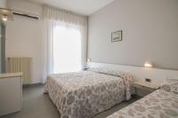 Posteľ alebo postele v izbe v ubytovaní B&B Hotel Souvenir