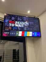 TV a/nebo společenská místnost v ubytování Holiday Luxury Resort Sundance