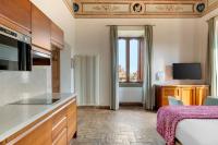 A television and/or entertainment centre at Palazzo Catalani Resort