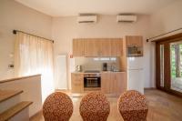 A kitchen or kitchenette at Palazzo Catalani Resort
