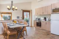 A kitchen or kitchenette at Palazzo Catalani Resort