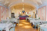 A restaurant or other place to eat at Palazzo Catalani Resort