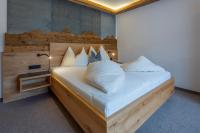 Posteľ alebo postele v izbe v ubytovaní Gästehaus Brantlhof Zimmer und Ferienwohnungen in Going am Wilden Kaiser