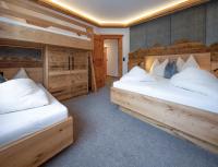 Posteľ alebo postele v izbe v ubytovaní Gästehaus Brantlhof Zimmer und Ferienwohnungen in Going am Wilden Kaiser
