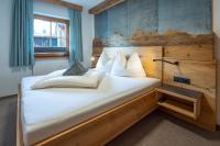 Posteľ alebo postele v izbe v ubytovaní Gästehaus Brantlhof Zimmer und Ferienwohnungen in Going am Wilden Kaiser