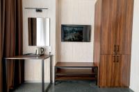 MISTO capsule hotelにあるテレビまたはエンターテインメントセンター