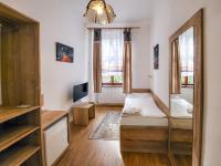 Postel nebo postele na pokoji v ubytování Pension City