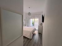 Postel nebo postele na pokoji v ubytování Villa Bobita-Marina Golf-Playa Granada