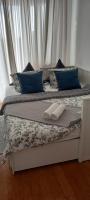 Łóżko lub łóżka w pokoju w obiekcie AnJa Apartment