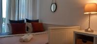 Łóżko lub łóżka w pokoju w obiekcie AnJa Apartment