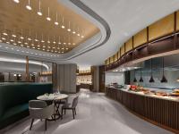 a restaurant with a table and chairs and a buffet at Doubletree By Hilton Nanning Wuxiang in Nanning