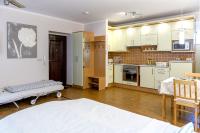 Kuchyňa alebo kuchynka v ubytovaní Atmoszféra Apartman