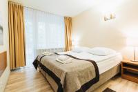 Łóżko lub łóżka w pokoju w obiekcie Hotel Orle