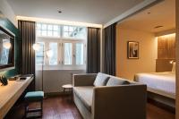 KēSa House, The Unlimited Collection managed by The Ascott Limitedにあるベッド