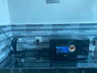 Laman Norras Homestayにあるテレビまたはエンターテインメントセンター