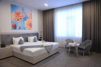 Hotel Inspira-S Tashkentにあるベッド