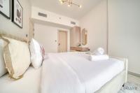 Postel nebo postele na pokoji v ubytování Timeless 1BR at Binghatti Avenue Al Jaddaf by Deluxe Holiday Homes