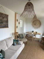 Część wypoczynkowa w obiekcie Les Cottages de Carine