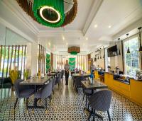 TV a/nebo společenská místnost v ubytování HUE GUH The Porto Candolim