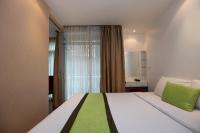Postel nebo postele na pokoji v ubytování iCheck inn Residences Patong