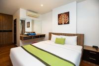 Postel nebo postele na pokoji v ubytování iCheck inn Residences Patong