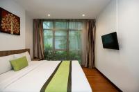 Postel nebo postele na pokoji v ubytování iCheck inn Residences Patong