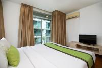 Postel nebo postele na pokoji v ubytování iCheck inn Residences Patong