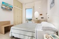 Posteľ alebo postele v izbe v ubytovaní Hotel Astoria