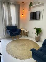 Pousada hostel praia itapuaにあるテレビまたはエンターテインメントセンター