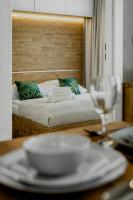 Posteľ alebo postele v izbe v ubytovaní Apartamenty KAPRYS - Centrum