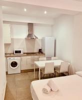 Kuchyňa alebo kuchynka v ubytovaní Apartamentos Pintor Losada
