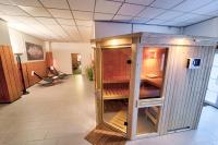 a room with a small cabinet in the middle of a hallway at Hotel Tanne in Saalfeld