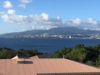 a view of the water from a roof of a house at Les Tuileries in Les Trois-Îlets