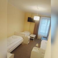 Posteľ alebo postele v izbe v ubytovaní Motel Tower