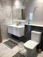 Koupelna v ubytování Super appartement avec 5 piscines en résidence
