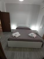 Posteľ alebo postele v izbe v ubytovaní B&B RAFFAELA